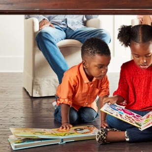 Kids with book | Tom's Carpet & Flooring Outlet
